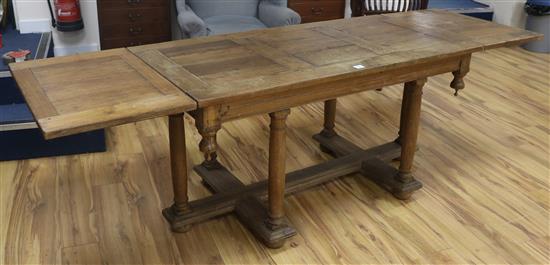 A late 17th century oak draw leaf dining table